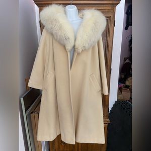 Vintage winter coat with real fur collar.
